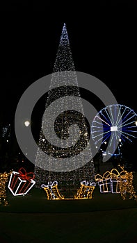 Christmas tree with presents and Christmas Ferris wheel