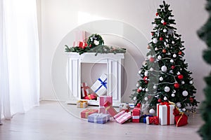 Christmas tree with presents, Garland lights new year holiday decor