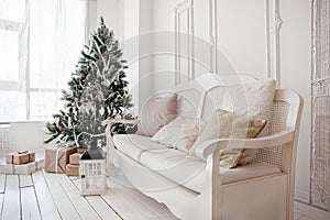 Christmas tree with presents underneath in living room