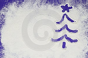 Christmas tree in purple on white background. Winter flour background with copy space. Color of Year 2022 Velvet violet