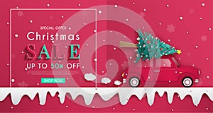 Christmas tree is on the red car and the design of origami or paper cutting background