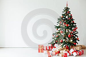 Christmas tree red decor with gifts for the new year