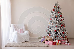 Christmas tree in a room with toys and gifts holiday new year winter postcard