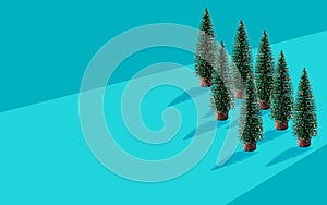 Christmas tree with shadow on light blue two tone color background. Artwork minimal illustration pastel color design for new year,