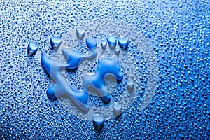 christmas tree shape between blue water drops