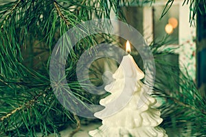 Christmas tree shape candle selective focus