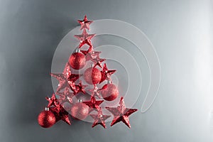 Christmas tree shape with red stars and baubles