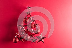 Christmas tree shape with red stars and baubles