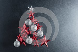 Christmas tree shape with red stars and silver baubles