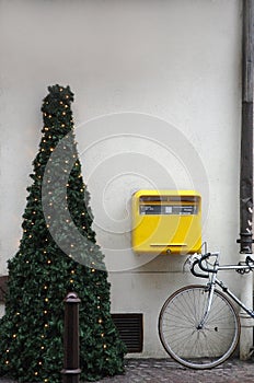 Christmas tree on sidewalk