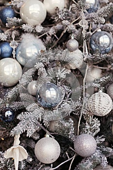 Christmas tree with silver and blue decorations