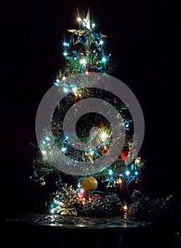 Christmas tree with star, ancor and bells