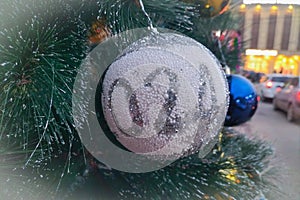 A Christmas tree toy with minor damage, as a symbol of a bad omen on New Year's Eve