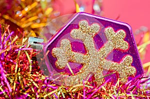 Christmas-tree toy on a pink background