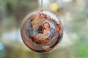 Christmas tree toy with the scene of the birth of Jesus Christ