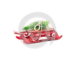 Christmas tree on toy sled. Christmas holiday celebration concept