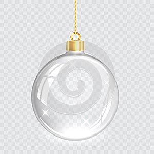 Christmas tree toy. Transparent glass Christmas ball hangs from a gold chain. Isolation on a checkered background photo