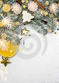 Christmas tree vertical holiday frame, decor, garland lights, creative soft bokeh on white snow background with copy space