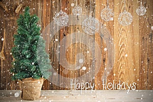 Christmas Tree, Wooden Background, Happy Holidays, Snow And Ornament