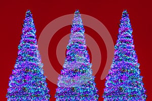 Christmas trees led lights, red background