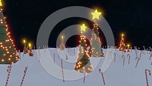 Christmas trees, light decorations with yellow stars on top, standing in a snowy ground in the night