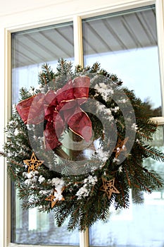 Christmas twig wreath with snow