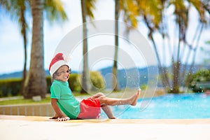 Christmas vacation on tropical island. Xmas kids