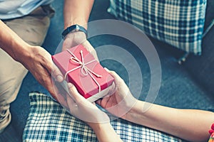 Christmas, valentine, holidays gift box concept. Couple surprise gift box together