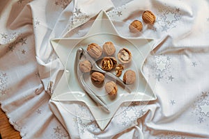 Christmas walnuts plate with nutcracker