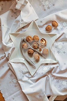 Christmas walnuts plate with nutcracker