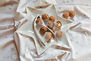 Christmas walnuts plate with nutcracker