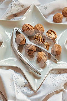 Christmas walnuts plate with nutcracker