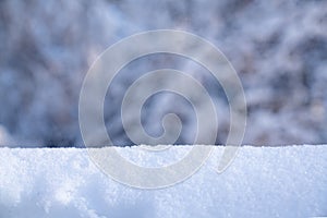 Christmas winter background with snow and blurred bokeh