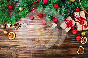 Christmas winter background, a table decorated with fir branches and decorations. Happy New Year. Merry Christmas.