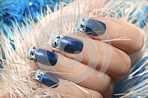 Christmas winter blue design French manicure with snowflakes.