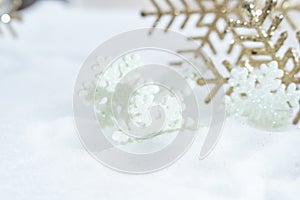 Christmas of  winter - Christmas Snowflakes on snow, Winter holidays concept. White and Golden Snowflakes decorations In Snow Back