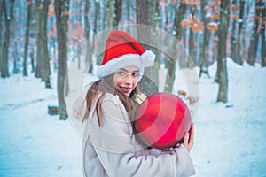 Christmas winter holidays concept. Young woman winter portrait. Winter concept. Beautiful young woman laughing outdoors