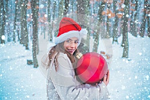 Christmas winter holidays concept. Young woman winter portrait. Winter concept. Beautiful young woman laughing outdoors