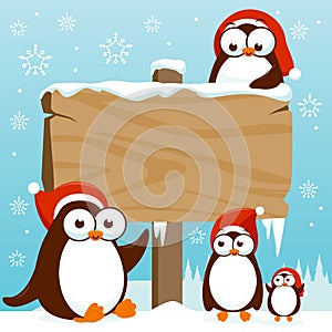 Christmas winter landscape with cute penguins and blank wooden sign. Vector Illustration