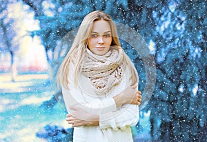 Christmas, winter and people concept - beautiful woman outdoors