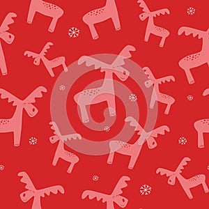 Christmas and winter themed seamless pattern, with reindeers and snowflakes on red background