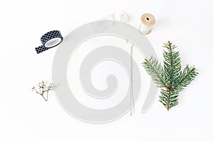 Christmas, winter wedding desktop stationery mock-up scene. Blank greeting card, envelope, black washi tape, silk ribbon