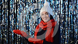 Christmas winter woman showing blank copy space