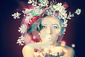 Christmas winter woman with tree hairstyle and makeup, magical fairy