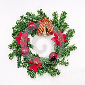 Christmas and winter wreath decoration on white silver glitter b