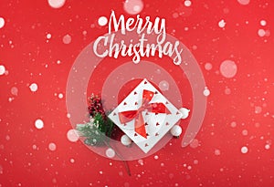 Christmas wish, new year composition on red beautiful background with falling snow, layout or template