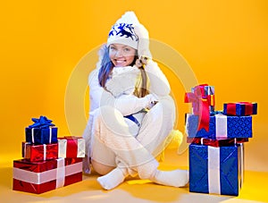 Christmas Woman. Beautiful New Year and Christmas Gift Holiday