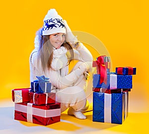 Christmas Woman. Beautiful New Year and Christmas Gift Holiday