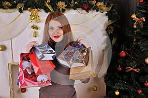 Christmas woman portrait with gift packages