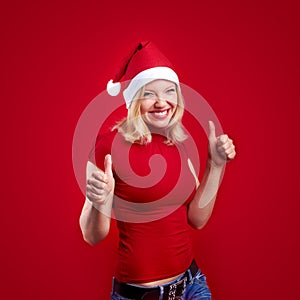 Christmas woman with thumbs up